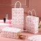 12 Pcs Coquette Pink Bow Flower Party Favor Bag Paper Pink Gift Goodie Candy Treat Bag Bulk with Handles for Birthday Bachelorette Decoration Bridal Baby Shower Party Supplies